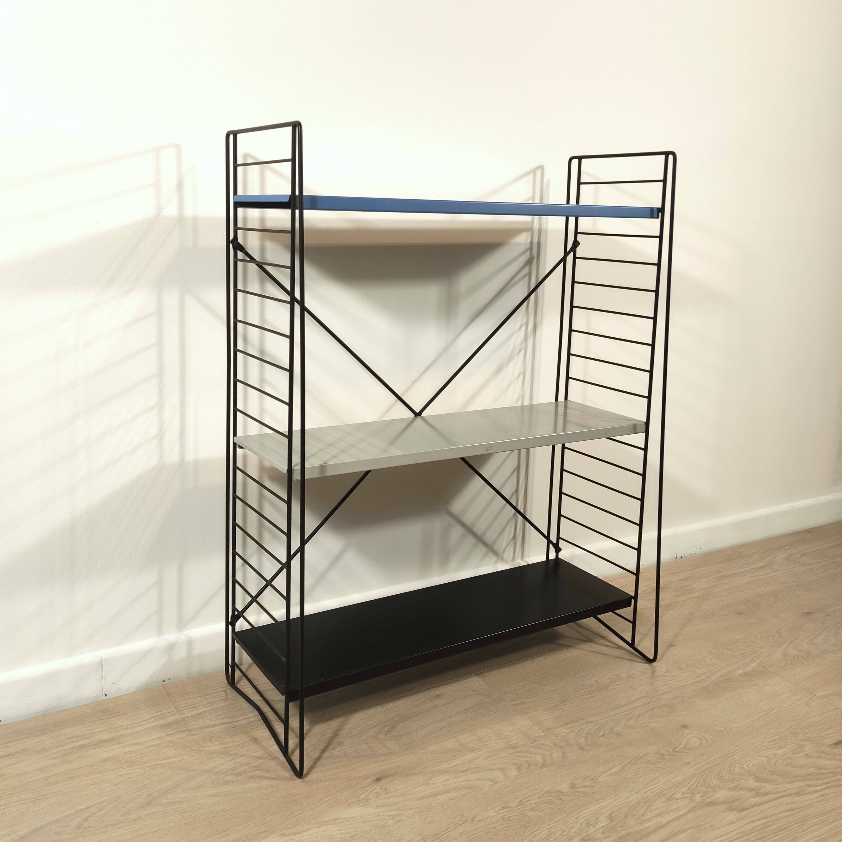 Mid century free standing rack with metal shelves by A. Dekker for Tomado