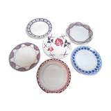 Six assiettes dépareillées en faîence