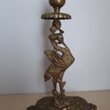 Pair of bronze candle holders decorated with herons
