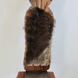 Brutalist cowhide tripod stool in solid wood