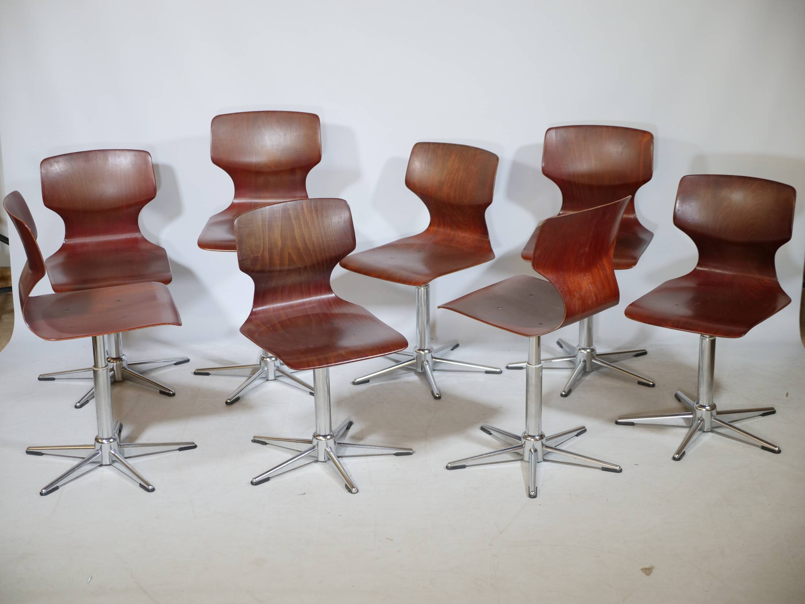 8 chaises pivotantes Flototto, années 70