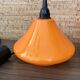Set of three orange opaline suspensions from the 1970s Space Age.