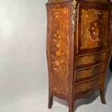 Curved secretary and inlaid with floral branches in Louis XV style