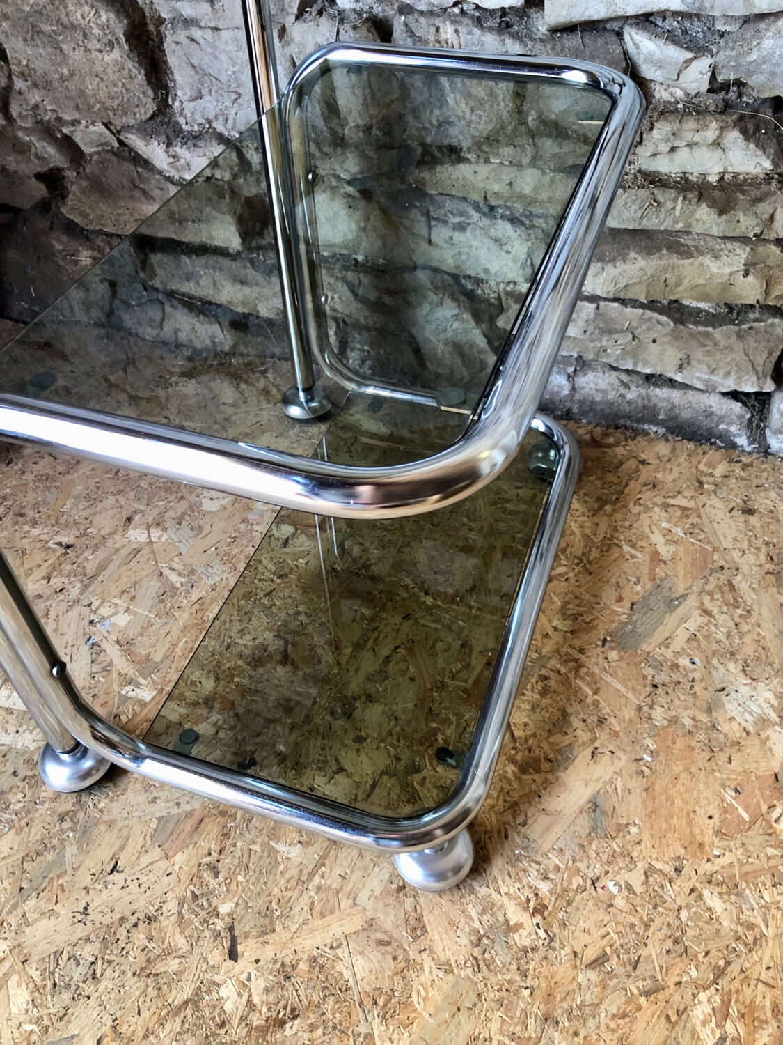 Chromed metal shelf and smoked glass