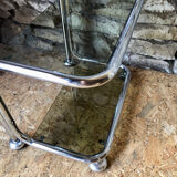 Chromed metal shelf and smoked glass