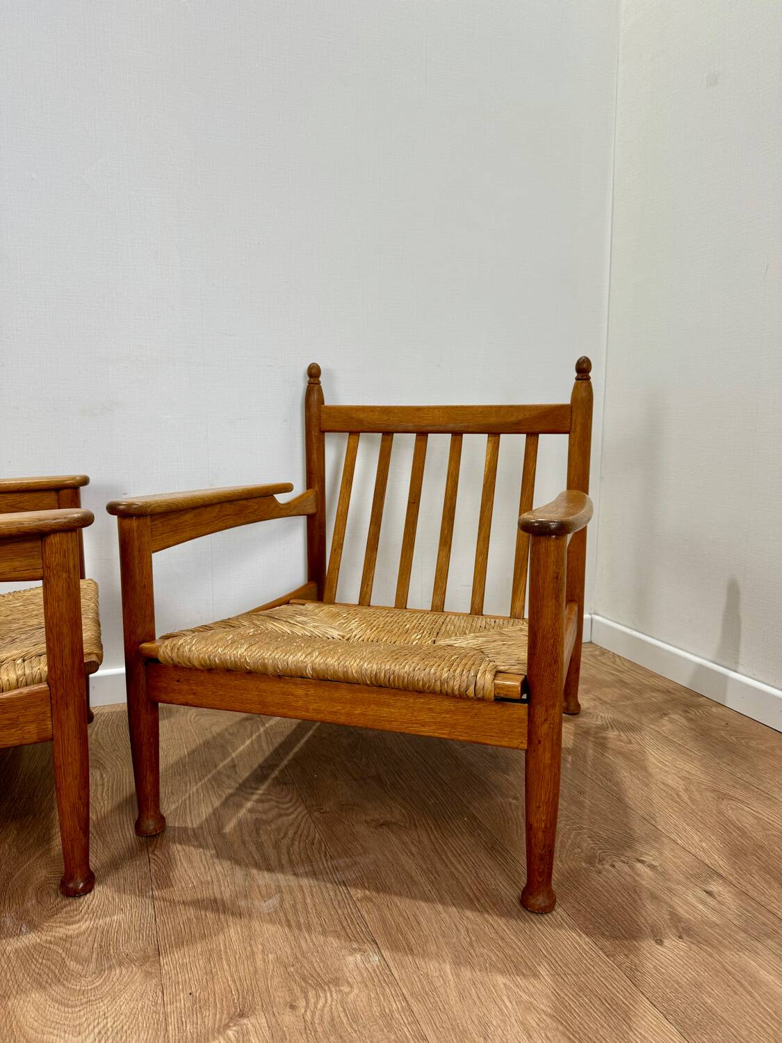 Pair of wooden and straw armchairs