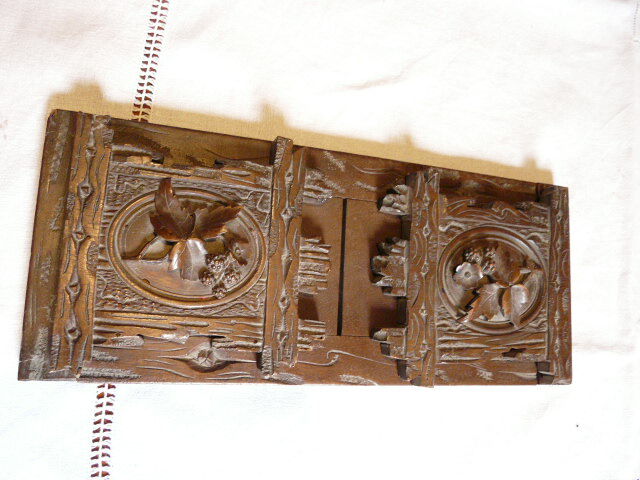 Ancien serre livre extensible forêt noire décor floral