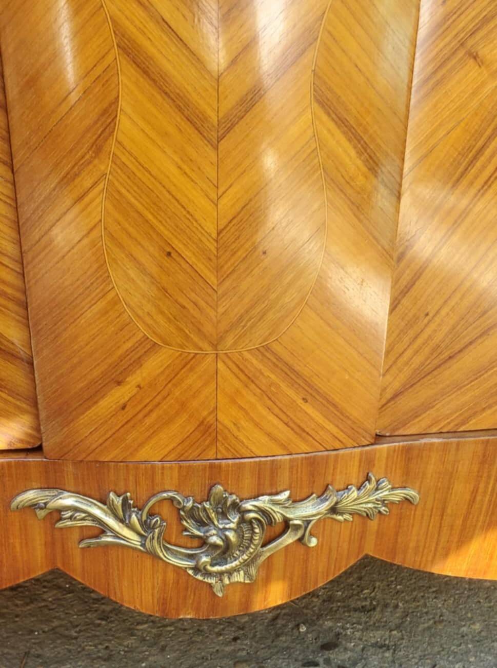 Two-door cabinet with marquetry floral design from the early 20th century.
