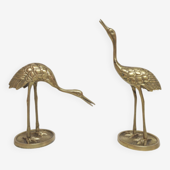 Golden brass heron pair