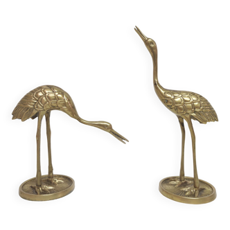 Golden brass heron pair