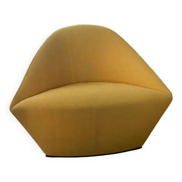 An Arper Colina armchair - Design by Lievore Altherr Molina, yellow.