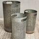 Vintage set of perforated metal waste bins