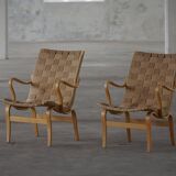Pair of Swedish armchairs from the mid-century by Bruno Mathsson, model "Eva", 1960s.