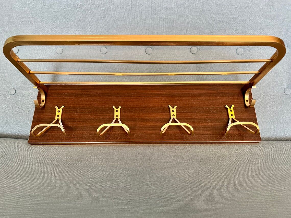 Vintage coat rack with 1970s repai décor
