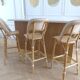 Lot of 3 Maison Louis Drucker light Manila rattan bistro high chairs.