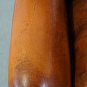 Sheepskin leather wingback chair with patina