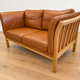Vintage Danish 2 person sofa in cognac leather with oak frame