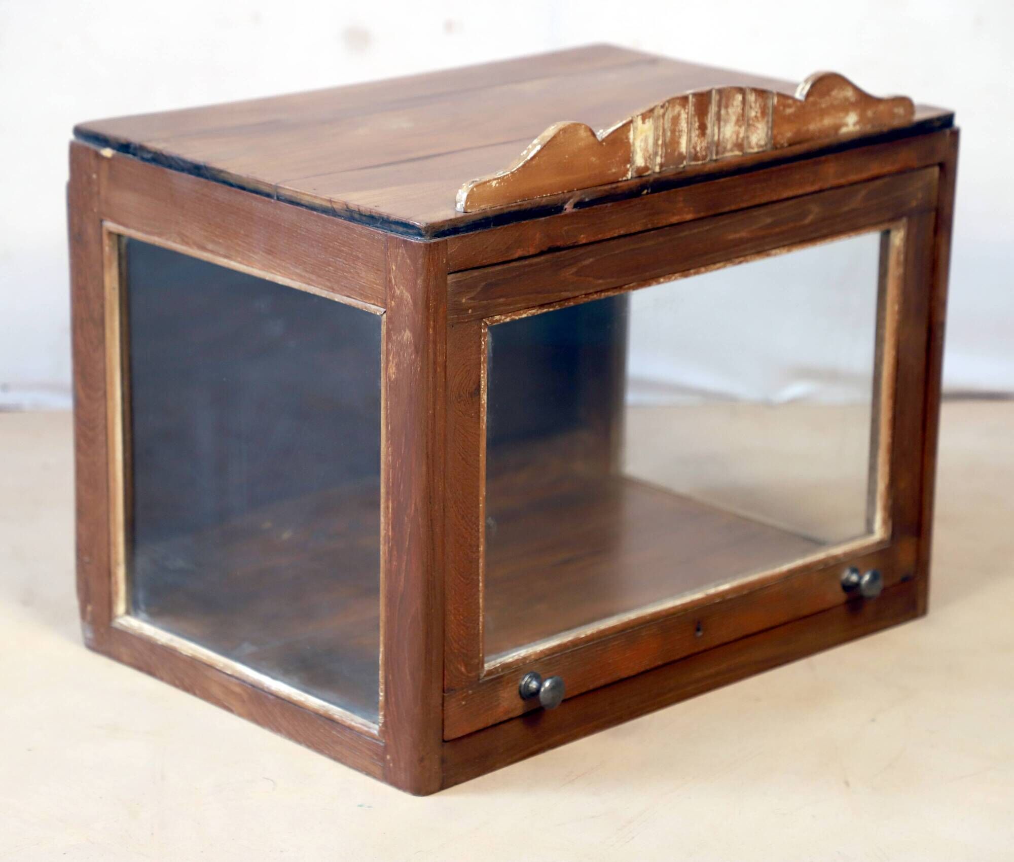 Art deco showcase in burmese teak
