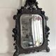Napoleon III mirror in carved blackened wood, 19th century
