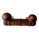 Wooden wall-mounted coat rack with two hooks