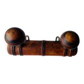 Wooden wall-mounted coat rack with two hooks