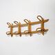 Wall coat rack in rattan and woven wicker, 1960s.