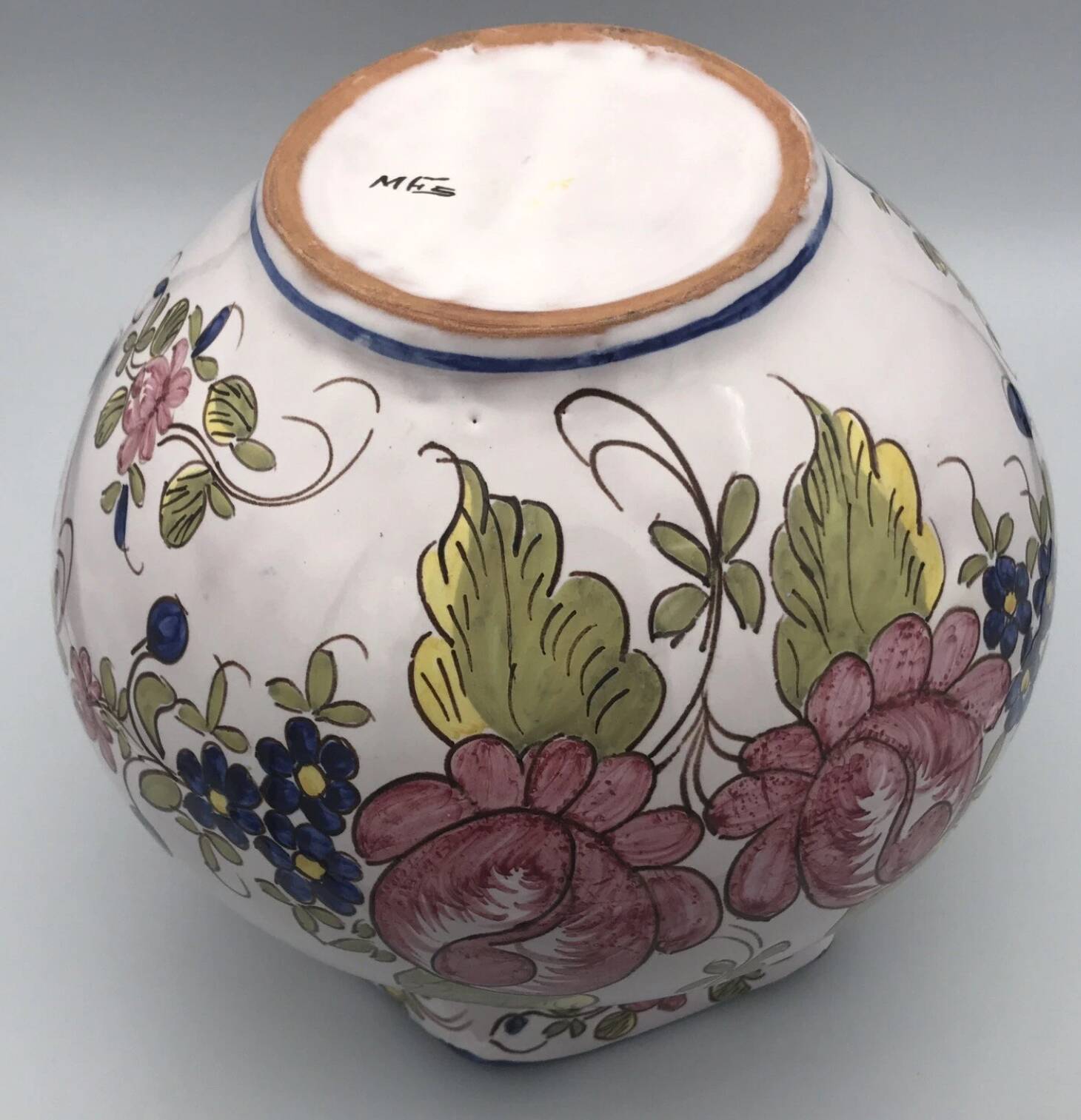 Round earthenware vase with polychrome floral motifs, signed