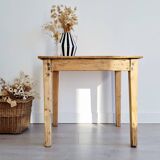 Antique farmhouse table in raw wood
