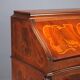 Antique drop-leaf table in walnut with maple inlays, Italy, 20th century.