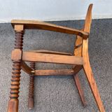 Vintage armchair in straw and brutalist wood