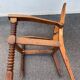 Vintage armchair in straw and brutalist wood