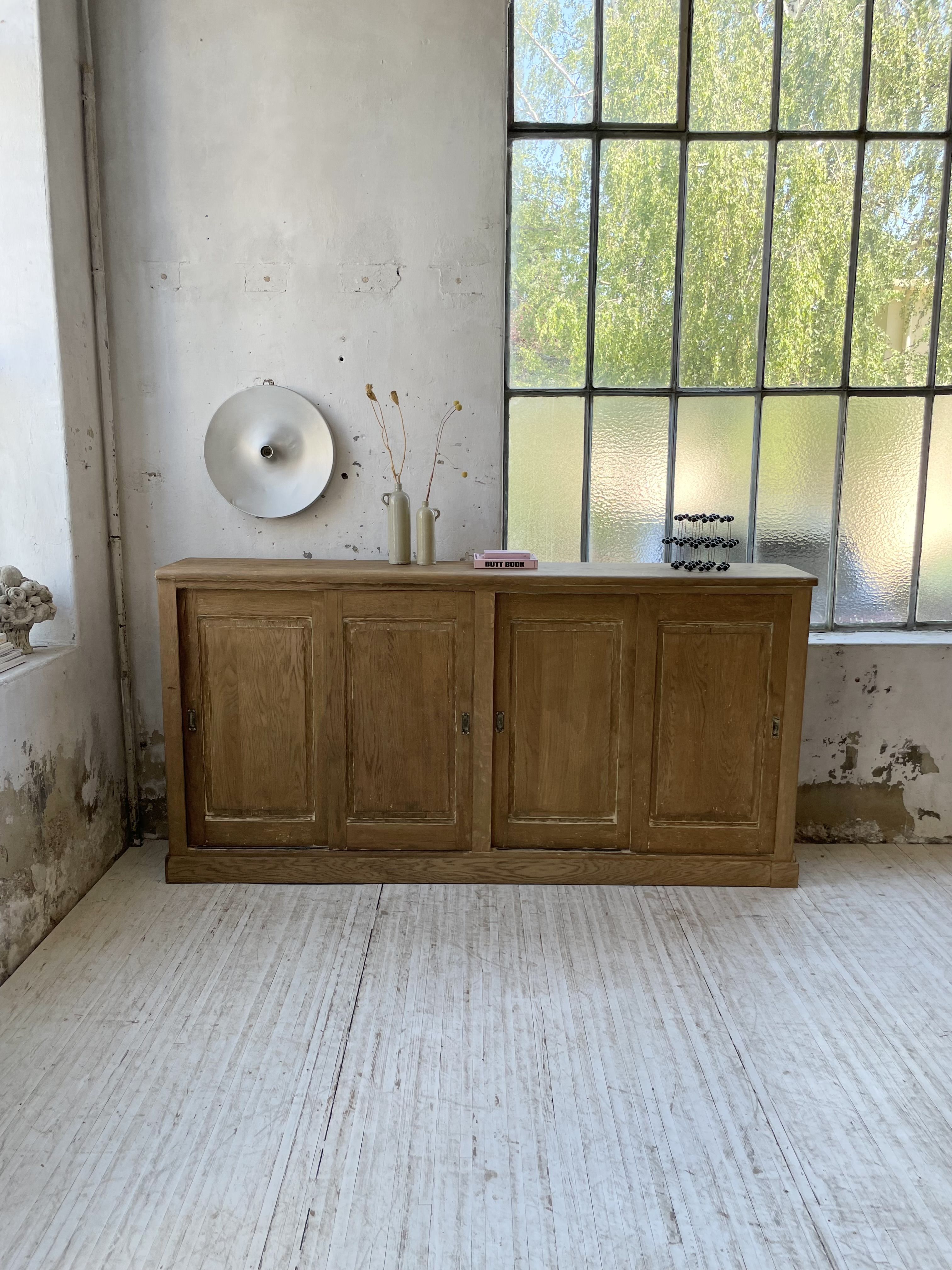 Large row of solid oak loom sliding doors