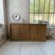 Large row of solid oak loom sliding doors