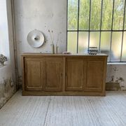 Large row of solid oak loom sliding doors