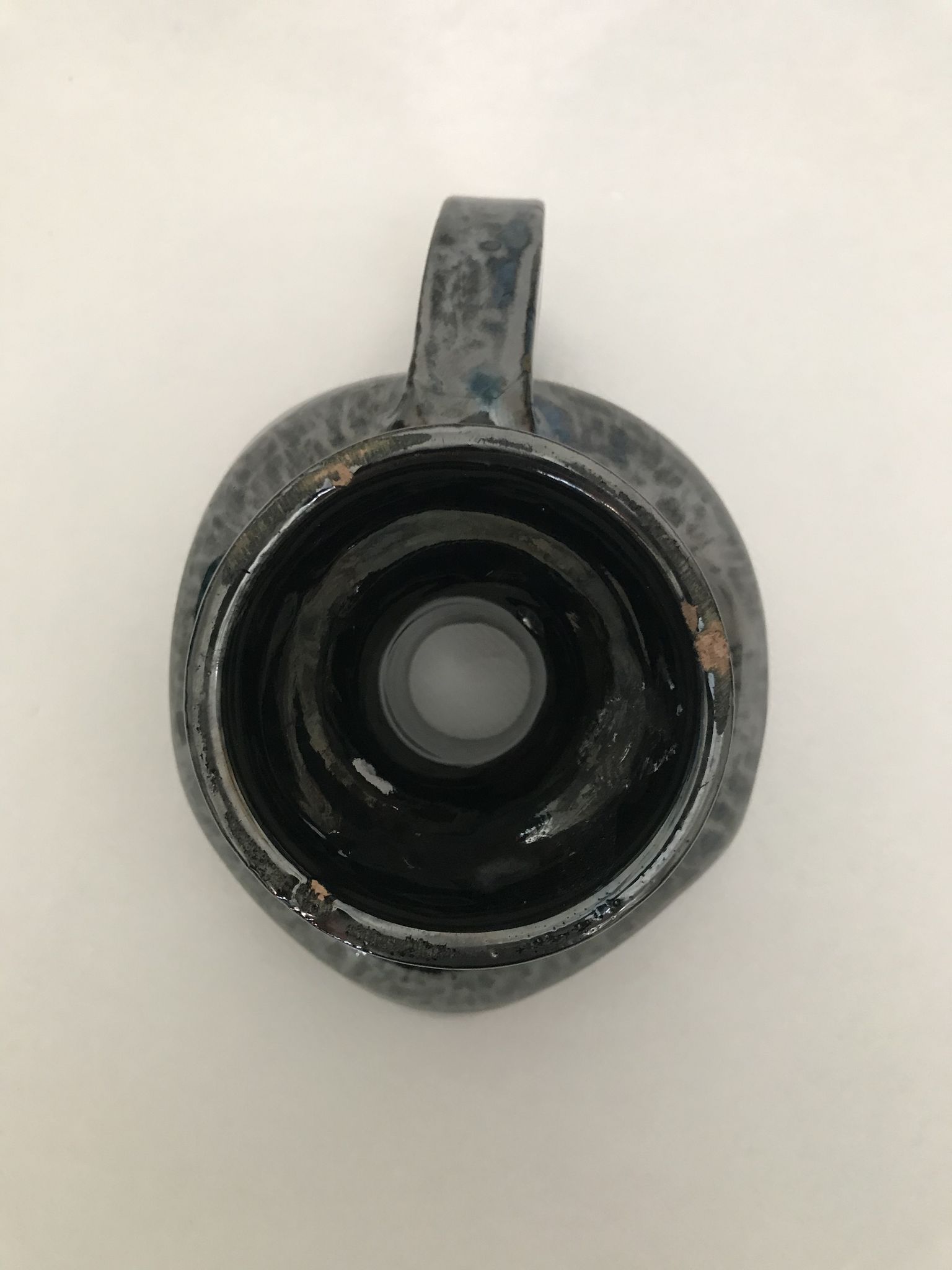 Black "hand- bougeoir with iridescents signed Fazio in Vallauris, circa 1950-1960