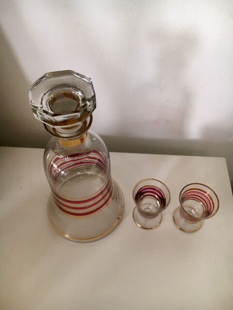 Glass carafe and two glasses