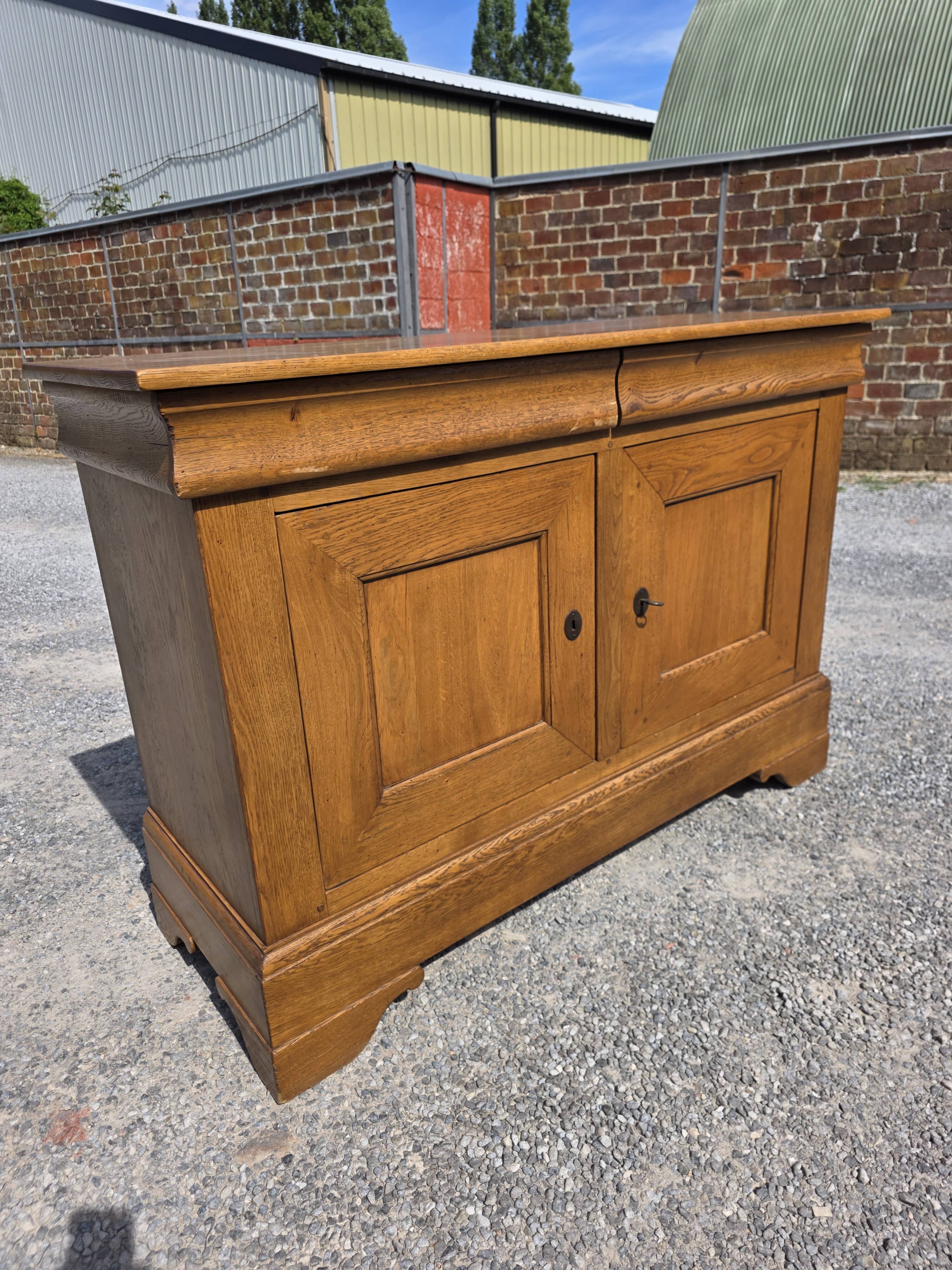 Louis Philippe buffet in solid oak.