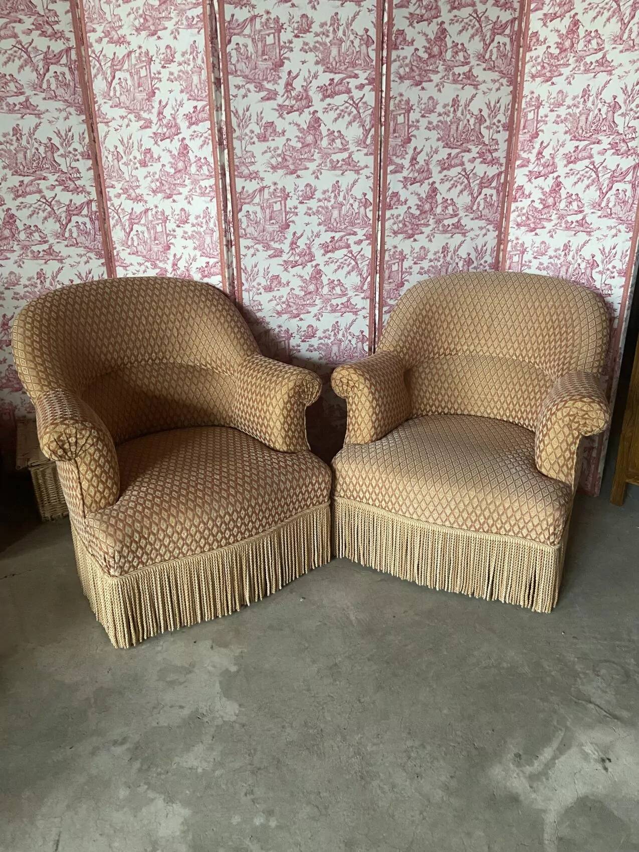 Pair of renovated upholstered frog chairs in beige velvet.