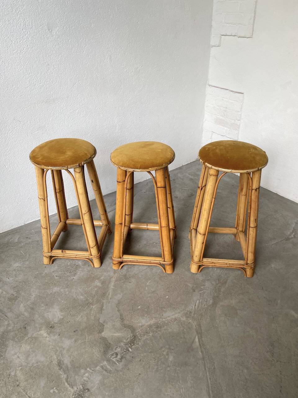 Set of three rattan high stools