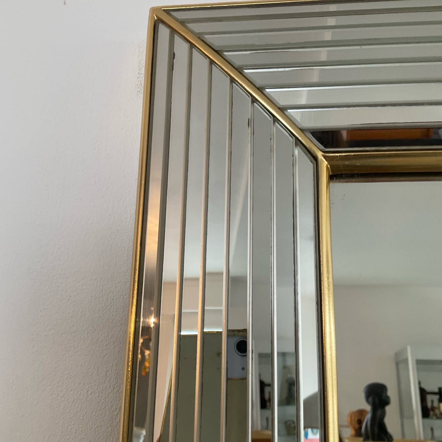 Large vintage Hollywood Regency style mirror with shutters.