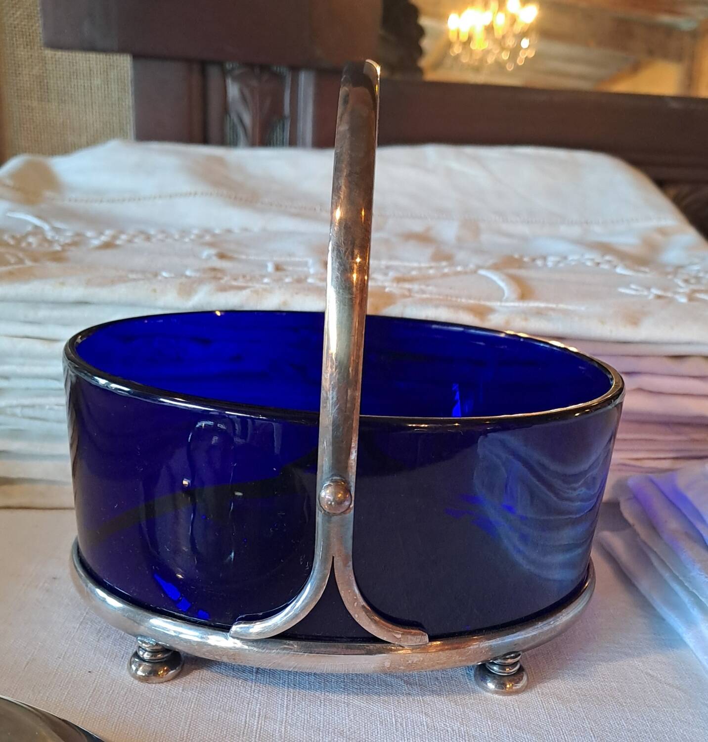 Silver-plated metal and blue glass biscuit jar
