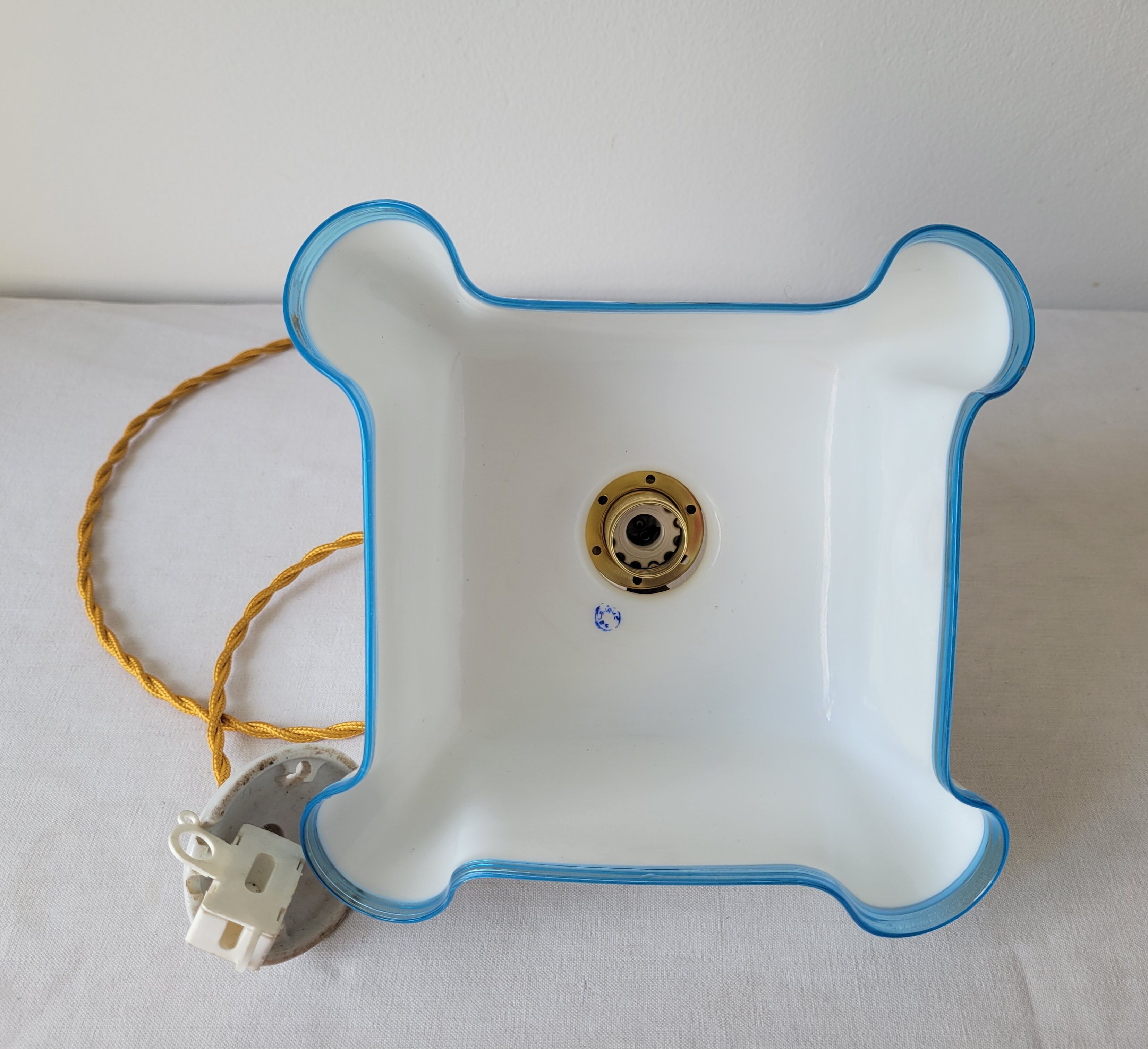 Draped opaline suspension