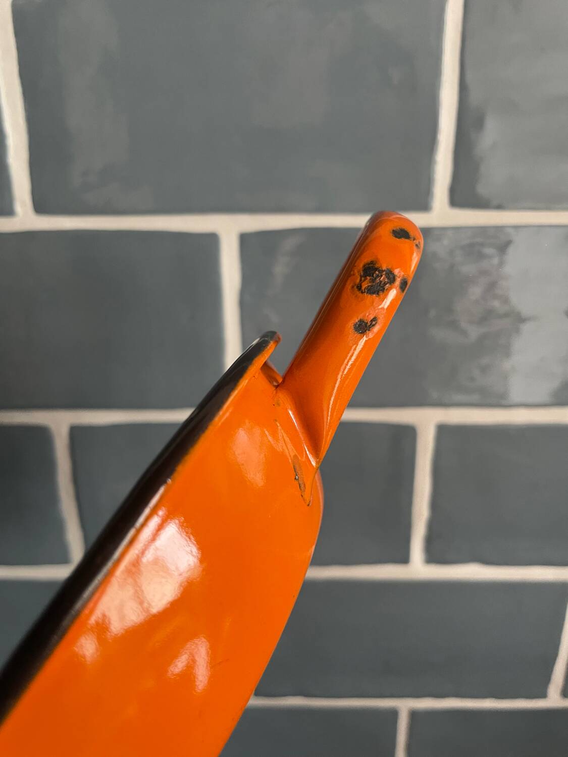 Orange enameled sheet egg dish