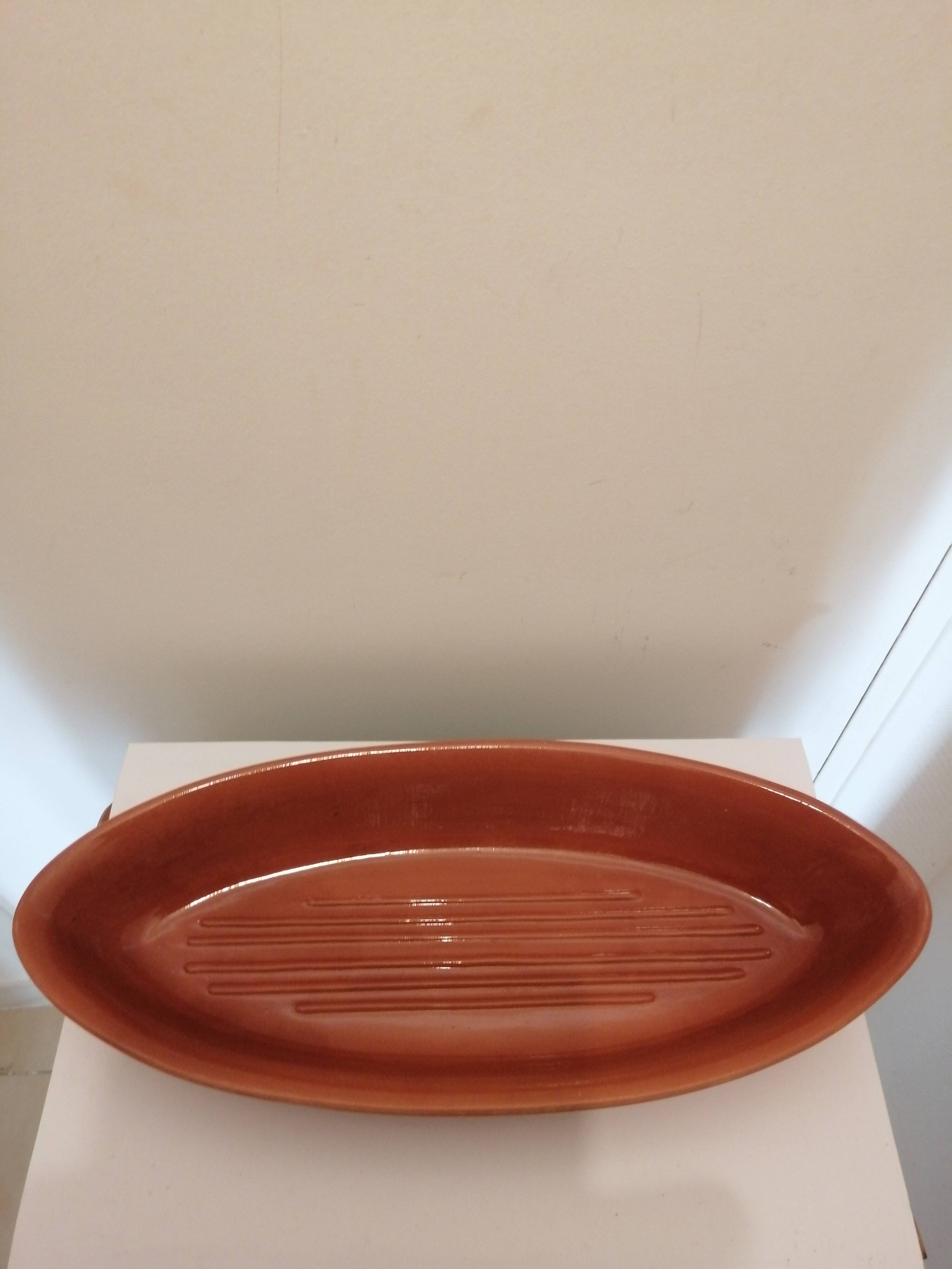 Fish shaped terracotta cooking dish