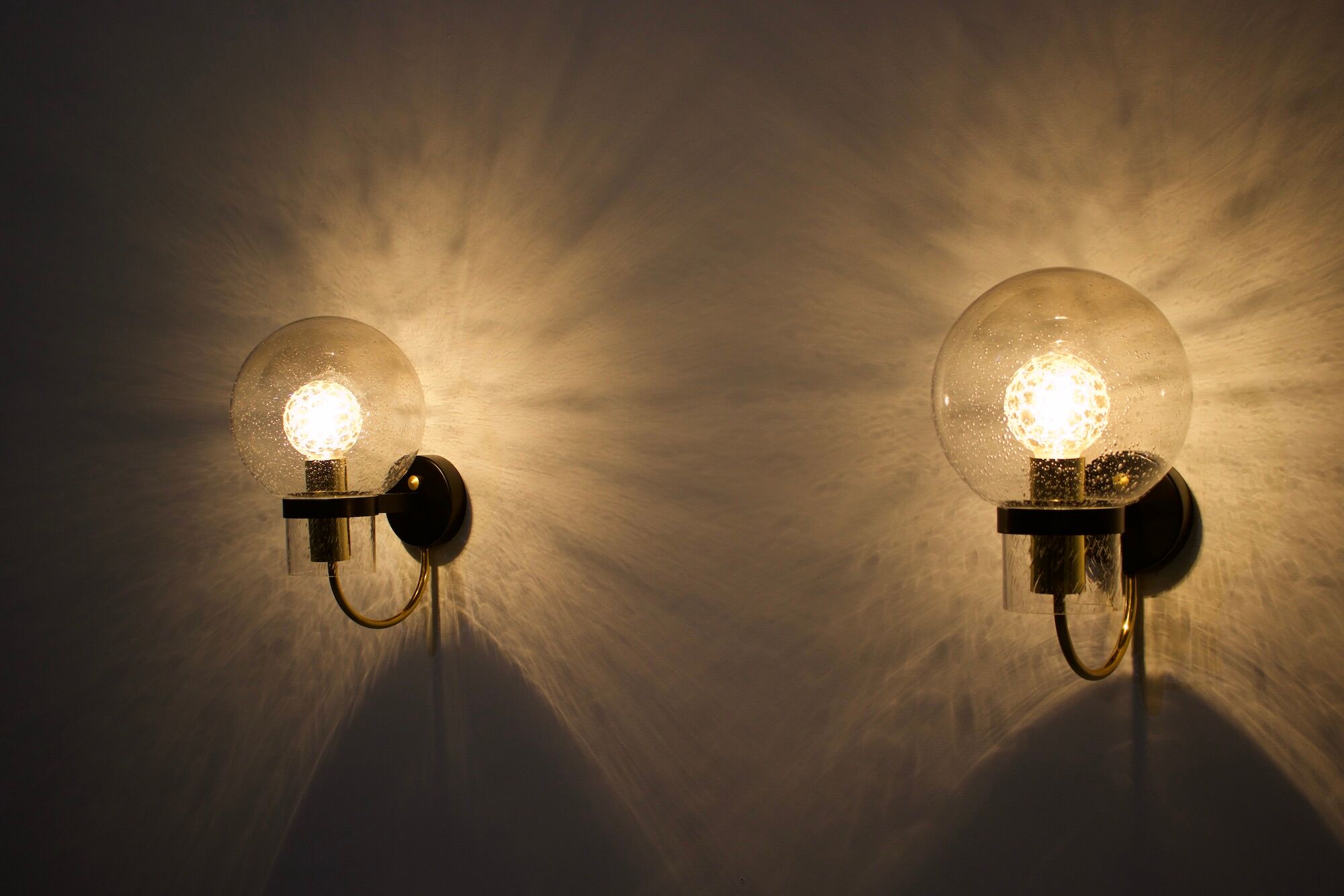 Wall lights with blown glass globes.
