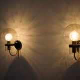 Wall lights with blown glass globes.