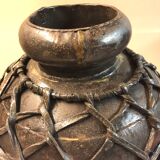 Metal and leather vase
