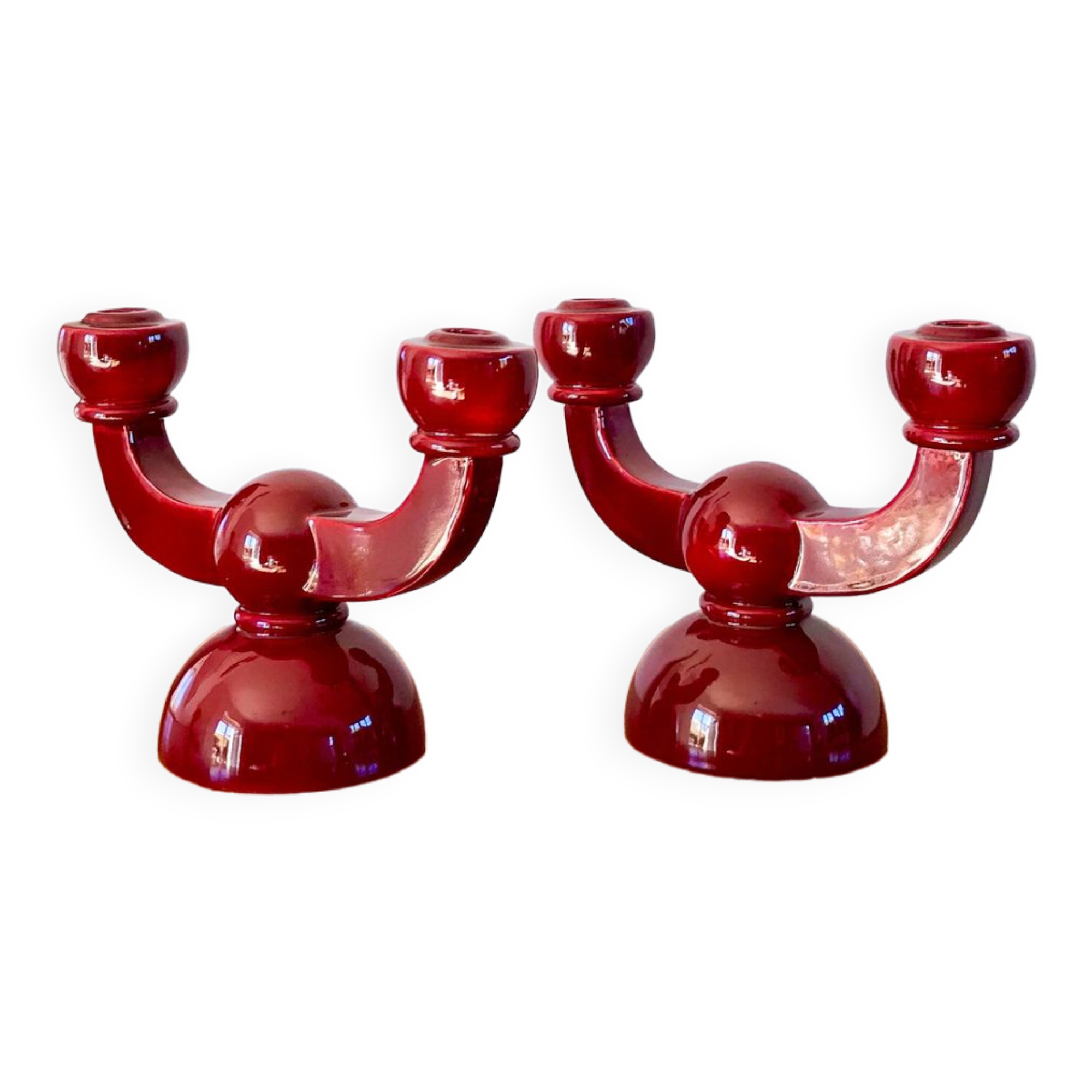pair of burgundy enameled ceramic candlesticks / candelabras signed 1949
