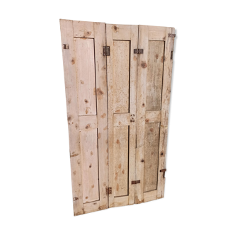 Old trio of wooden screen doors