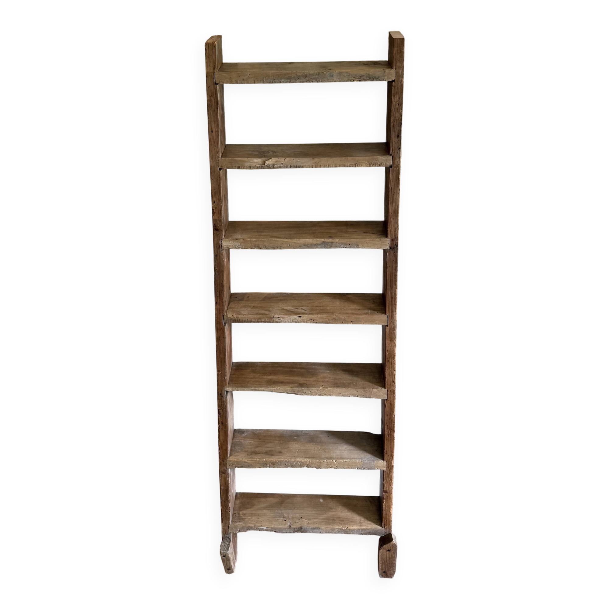 Decorative wooden ladder or towel rack.